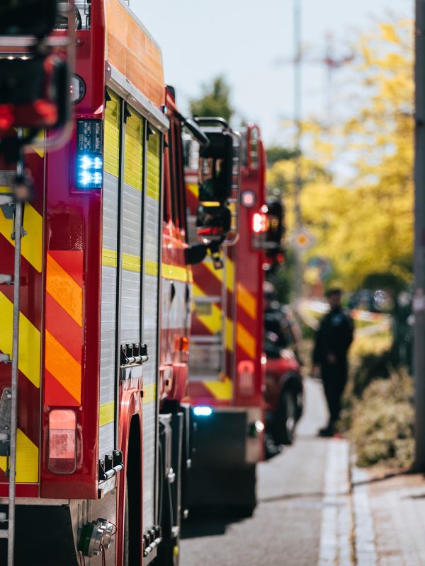 Red fire trucks in row